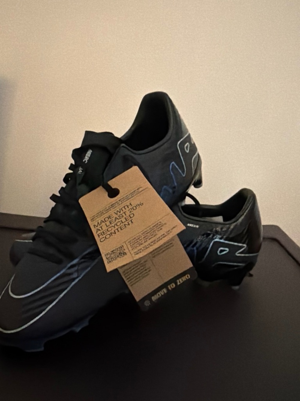 Nike Men's Black Soccer Cleats with Light Blue Accents